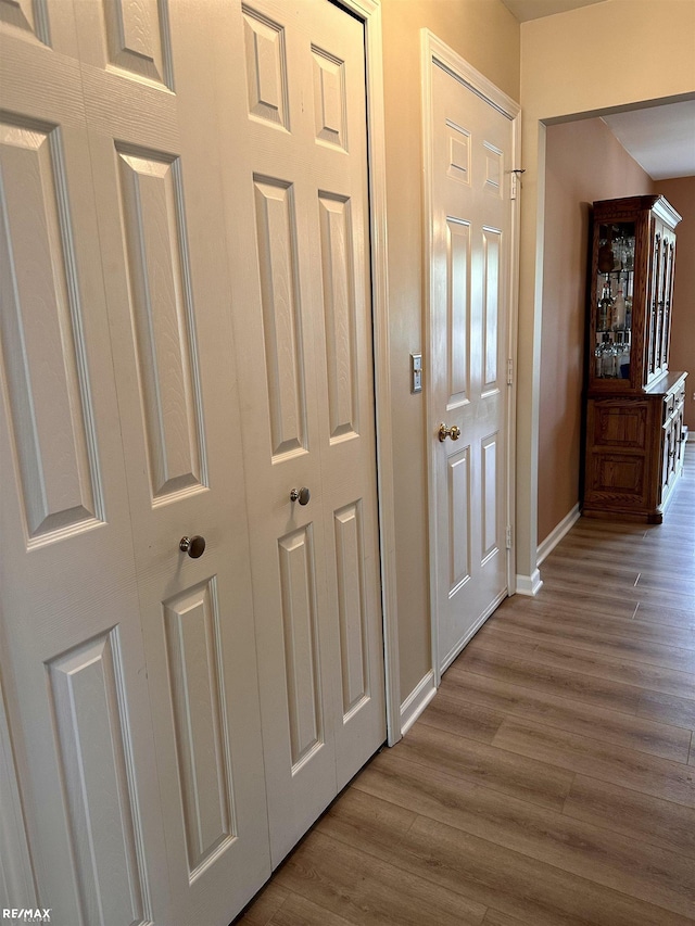 39148 Canterbury Dr, Harrison Twp, MI 48045 - hallway with wood finished floors and baseboards