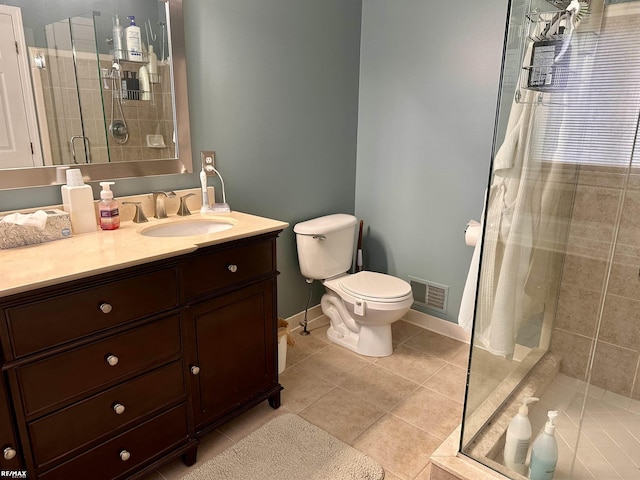 39148 Canterbury Dr, Harrison Twp, MI 48045 - bathroom featuring toilet, a shower stall, vanity, baseboards, and tile patterned floors