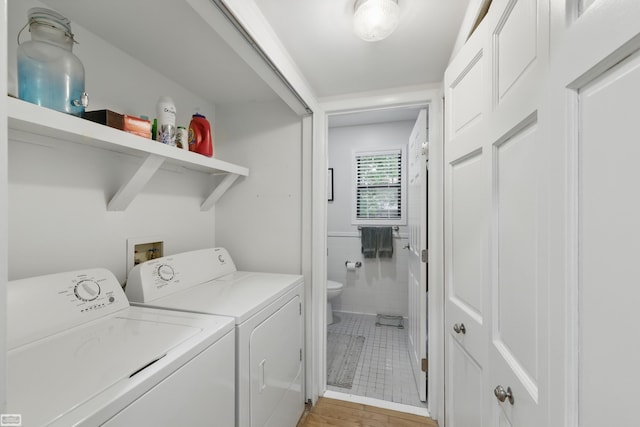 3620 Lakeshore Dr, Lapeer, MI 48446 - washroom featuring independent washer and dryer and light wood finished floors