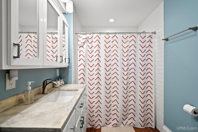 624 E G St, Iron Mountain, MI 49801 - bathroom with vanity and a shower with curtain
