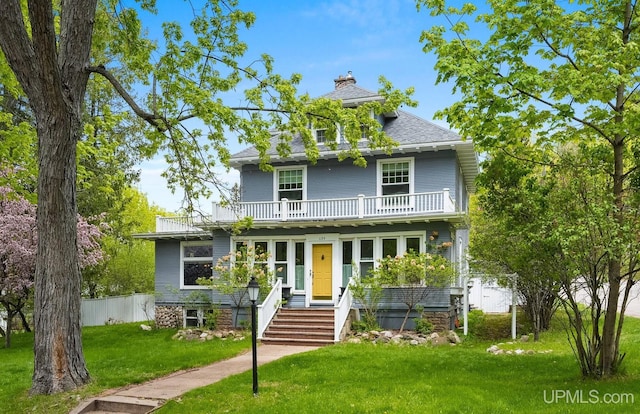 624 E G St, Iron Mountain, MI 49801 - traditional style home with a balcony and a chimney