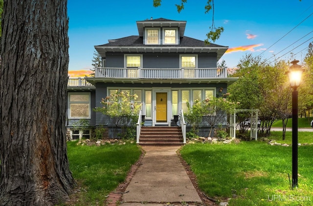 624 E G St, Iron Mountain, MI 49801 - traditional style home featuring a balcony and a front yard