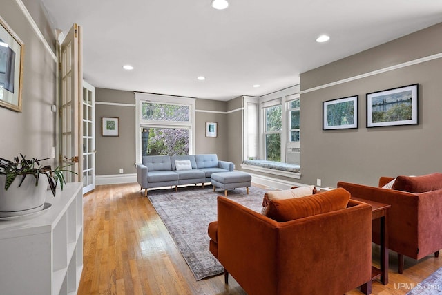 624 E G St, Iron Mountain, MI 49801 - living area featuring light wood-style floors, recessed lighting, and baseboards