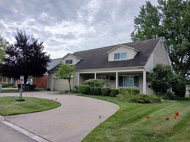 22460 La Von St, Saint Clair Shores, MI 48081 - cape cod house featuring brick siding, a front lawn, and curved driveway