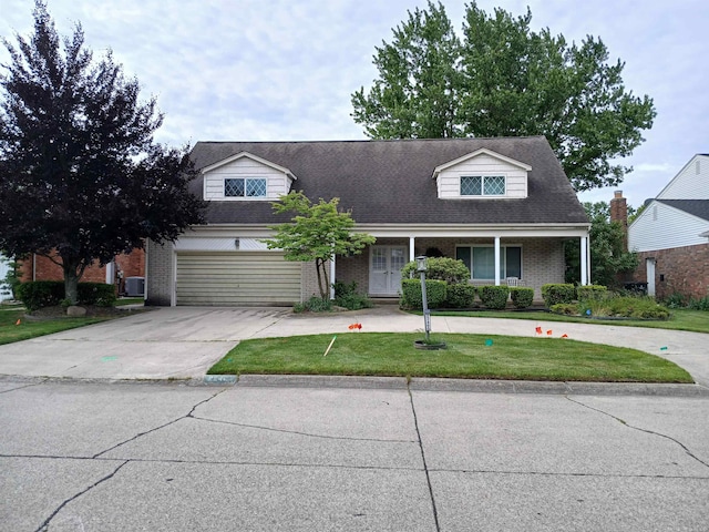 22460 La Von St, Saint Clair Shores, MI 48081 - cape cod-style house featuring driveway, brick siding, a front lawn, an attached garage, and central AC unit