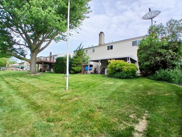 22460 La Von St, Saint Clair Shores, MI 48081 - back of house with a yard and a chimney