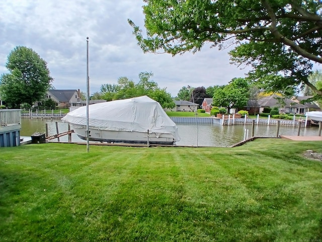 22460 La Von St, Saint Clair Shores, MI 48081 - view of green lawn featuring a water view, a dock, and boat lift