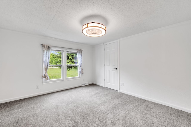 1371 Sturdevant St, Kimball, MI 48074 - carpeted empty room featuring a textured ceiling, baseboards, and ornamental molding