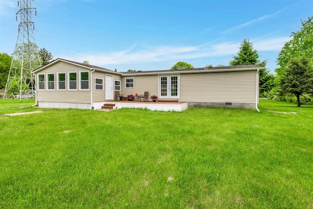 1371 Sturdevant St, Kimball, MI 48074 - back of property featuring french doors, a yard, a patio area, and crawl space