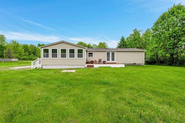 1371 Sturdevant St, Kimball, MI 48074 - back of house featuring french doors, crawl space, a yard, and a patio area
