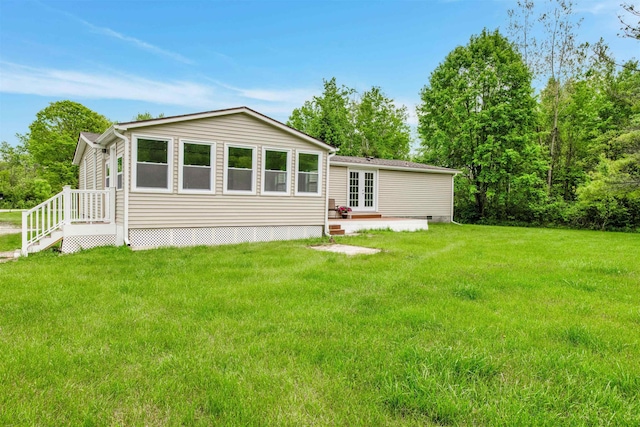 1371 Sturdevant St, Kimball, MI 48074 - rear view of house featuring a yard, french doors, and a patio area