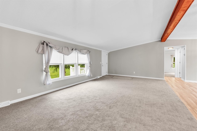 1371 Sturdevant St, Kimball, MI 48074 - unfurnished living room featuring baseboards, carpet flooring, beamed ceiling, ornamental molding, and wood finished floors