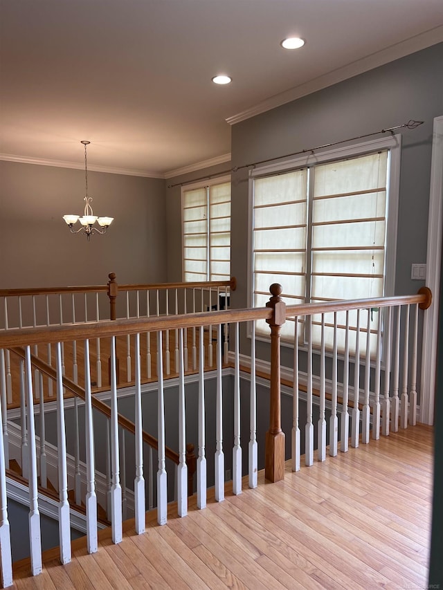 815 Cove Rd, Wales, MI 48027 - staircase featuring a chandelier, ornamental molding, wood finished floors, and recessed lighting