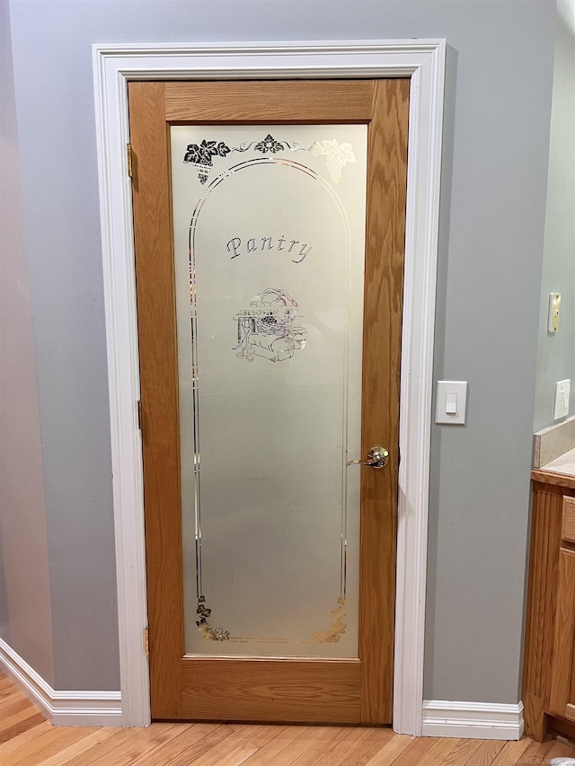 815 Cove Rd, Wales, MI 48027 - detailed view of wood finished floors and baseboards