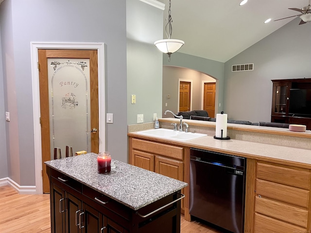 815 Cove Rd, Wales, MI 48027 - kitchen featuring dishwasher, a sink, open floor plan, light countertops, and a ceiling fan