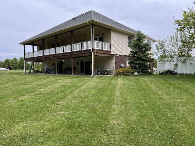 815 Cove Rd, Wales, MI 48027 - back of house featuring a yard