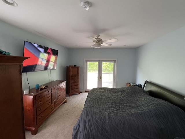 815 Cove Rd, Wales, MI 48027 - bedroom with access to outside, light colored carpet, french doors, and ceiling fan
