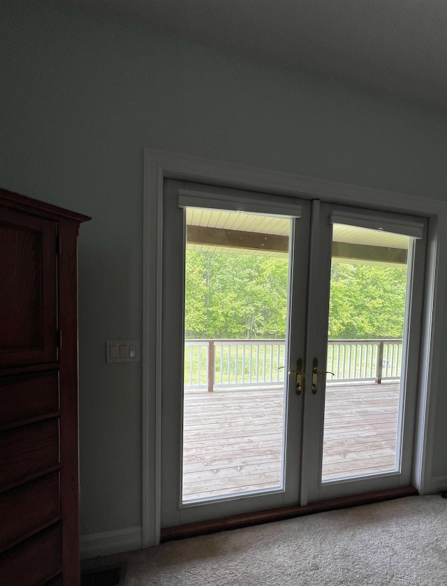 815 Cove Rd, Wales, MI 48027 - entryway with carpet flooring, french doors, and baseboards