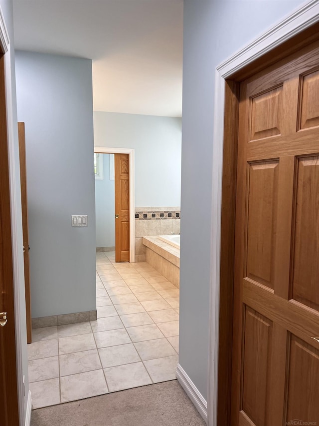 815 Cove Rd, Wales, MI 48027 - full bath with a bath, tile patterned flooring, and baseboards