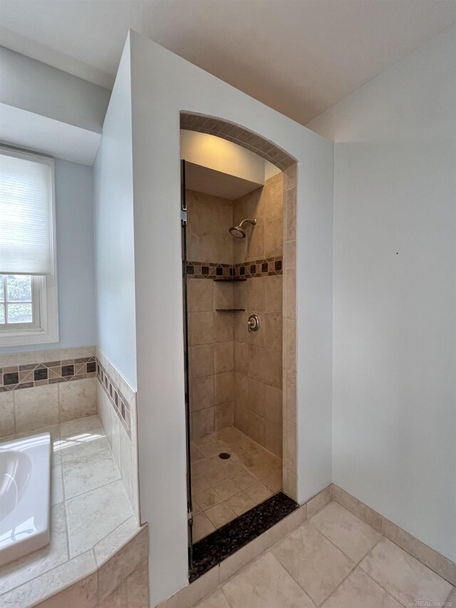 815 Cove Rd, Wales, MI 48027 - bathroom featuring a stall shower and tile patterned floors