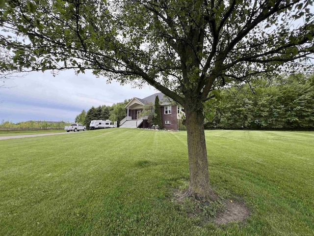 815 Cove Rd, Wales, MI 48027 - view of front facade featuring a front yard