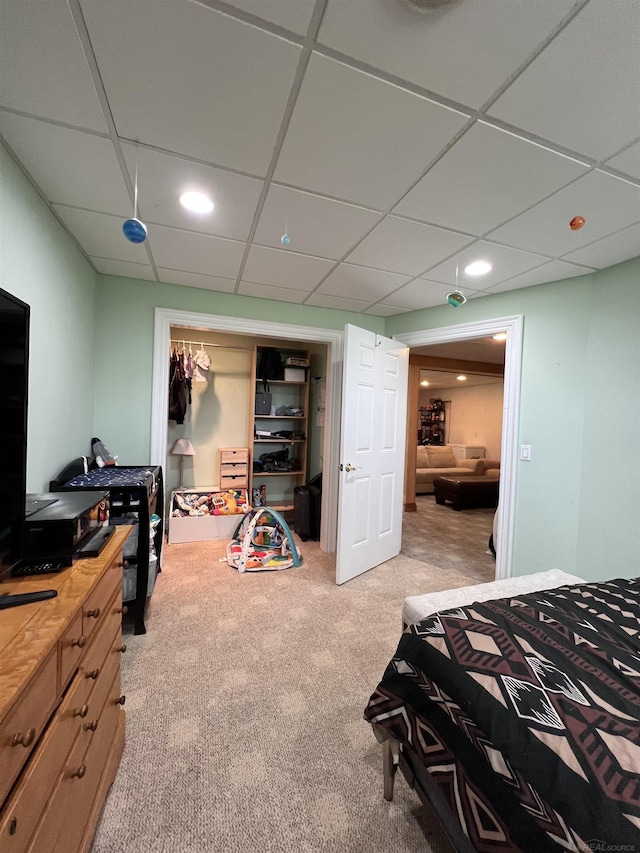 815 Cove Rd, Wales, MI 48027 - bedroom featuring carpet floors, a closet, a paneled ceiling, and recessed lighting