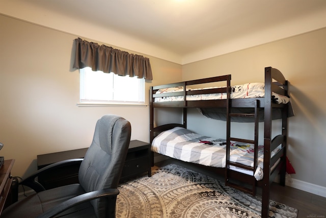 23300 Allor St, Saint Clair Shores, MI 48082 - bedroom with baseboards, wood finished floors, and a desk