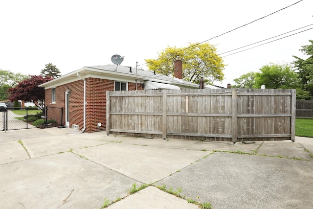 23300 Allor St, Saint Clair Shores, MI 48082 - view of property exterior with brick siding and a patio area
