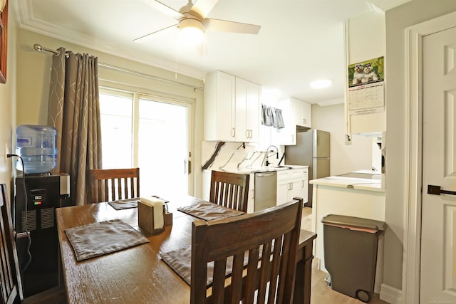 23300 Allor St, Saint Clair Shores, MI 48082 - dining area featuring crown molding, light wood finished floors, and a ceiling fan