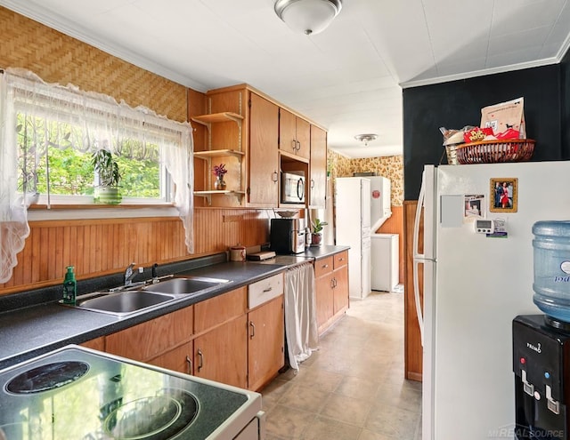 1471 James St, Burton, MI 48529 - kitchen with white appliances, open shelves, washer / dryer, wallpapered walls, and a sink