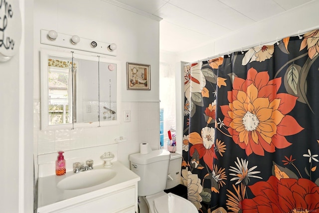 1471 James St, Burton, MI 48529 - full bathroom with vanity, toilet, ornamental molding, tile walls, and a shower with shower curtain
