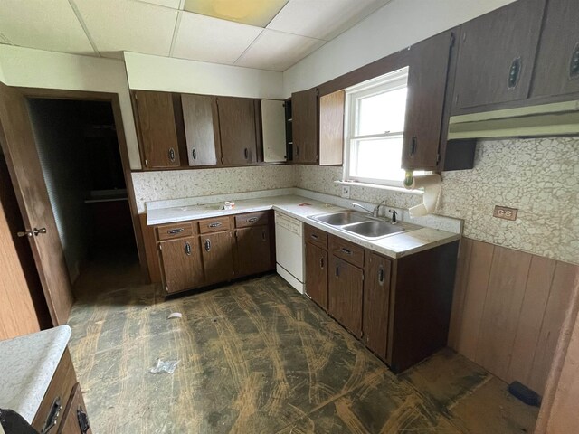 1625 N Oakley St, Saginaw, MI 48602 - kitchen with a sink, light countertops, dishwasher, a paneled ceiling, and dark brown cabinets