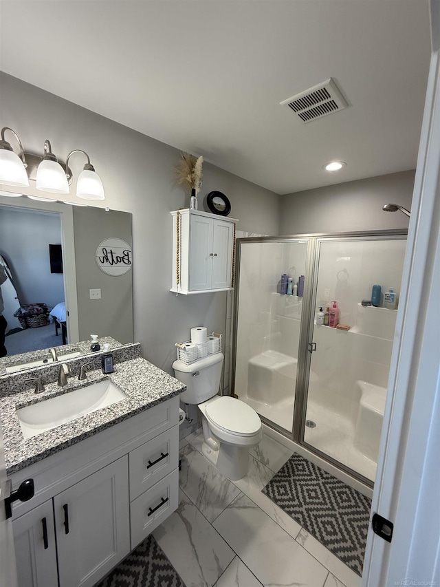 34317 Pratt Rd, Memphis, MI 48041 - ensuite bathroom with a stall shower, vanity, toilet, and marble look tile flooring