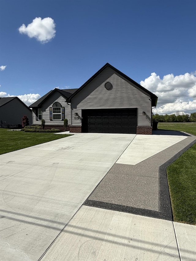 34317 Pratt Rd, Memphis, MI 48041 - ranch-style house featuring a garage, driveway, a front yard, and brick siding