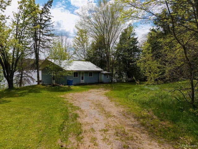 514/324 S Brook St, Michigamme, MI 49861 - view of green lawn with dirt driveway