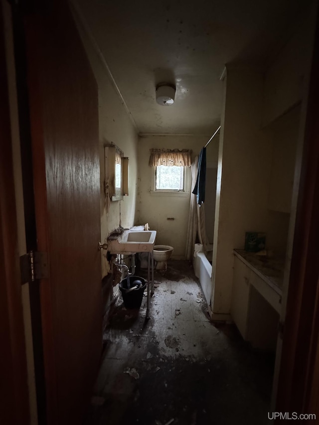 514/324 S Brook St, Michigamme, MI 49861 - bathroom with toilet, shower / bath combo with shower curtain, and a sink