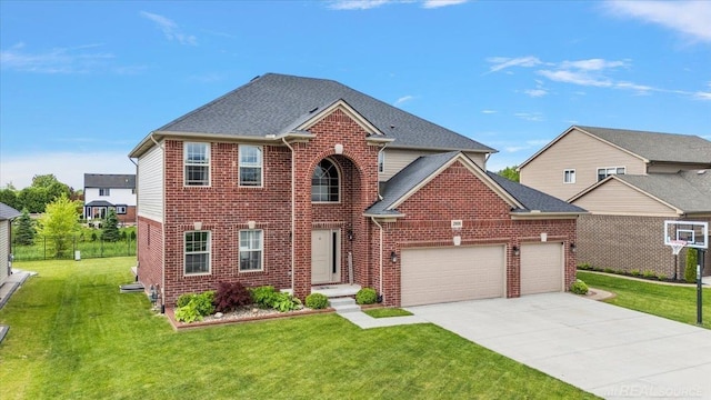 29696 Kevin Rd, New Baltimore, MI 48051 - view of front of home featuring a garage, brick siding, driveway, and roof with shingles