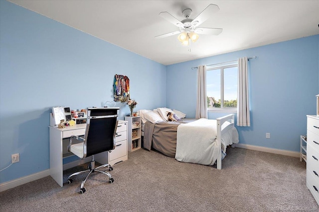 29696 Kevin Rd, New Baltimore, MI 48051 - bedroom featuring light carpet, an office area, baseboards, and a ceiling fan