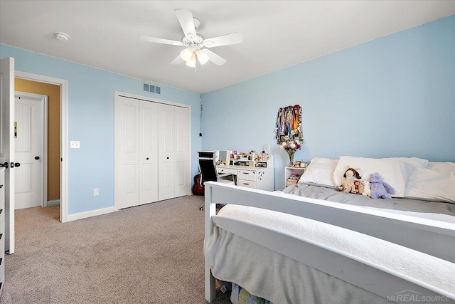 29696 Kevin Rd, New Baltimore, MI 48051 - carpeted bedroom with a closet, baseboards, and a ceiling fan