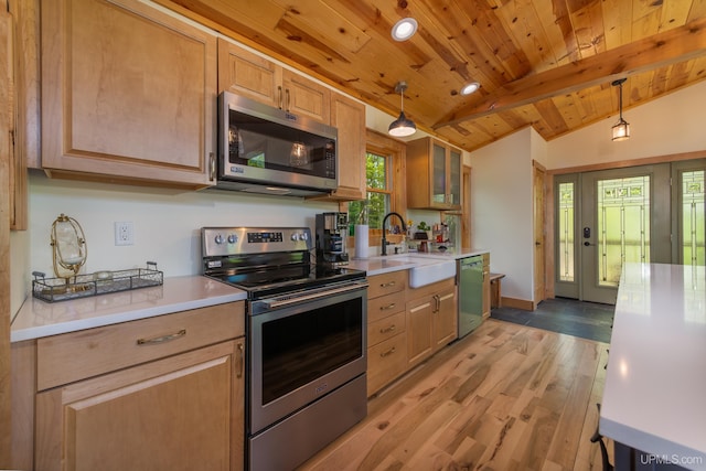 509 Red Rd, Michigamme, MI 49861 - kitchen with appliances with stainless steel finishes, wooden ceiling, light countertops, light wood-type flooring, and a sink