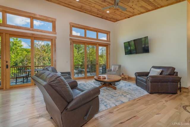 509 Red Rd, Michigamme, MI 49861 - living room featuring wooden ceiling, ceiling fan, light wood-style flooring, a high ceiling, and recessed lighting