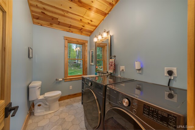 509 Red Rd, Michigamme, MI 49861 - bathroom featuring washing machine and clothes dryer, vaulted ceiling, wood ceiling, toilet, and baseboards