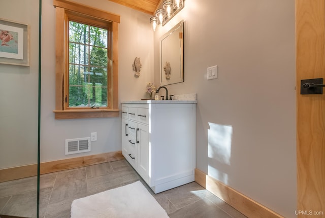 509 Red Rd, Michigamme, MI 49861 - bathroom with vanity and baseboards