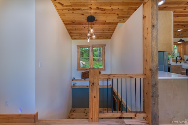 509 Red Rd, Michigamme, MI 49861 - staircase with wood ceiling and plenty of natural light
