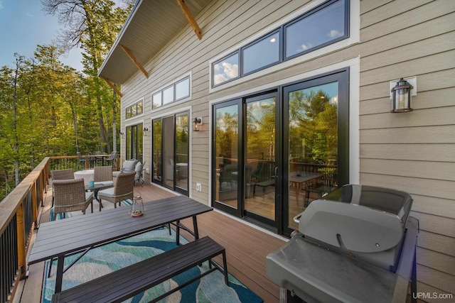 509 Red Rd, Michigamme, MI 49861 - wooden deck featuring outdoor dining area