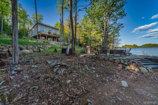 509 Red Rd, Michigamme, MI 49861 - view of yard with a deck with water view
