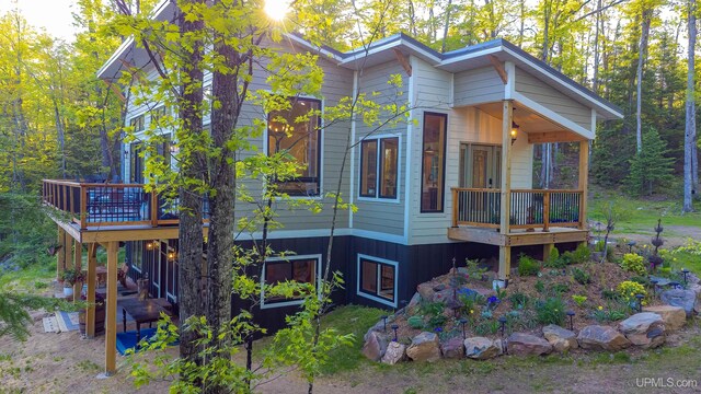 509 Red Rd, Michigamme, MI 49861 - view of side of home with a wooden deck