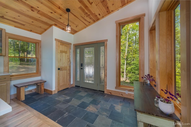 509 Red Rd, Michigamme, MI 49861 - foyer entrance with lofted ceiling, plenty of natural light, wood ceiling, and baseboards