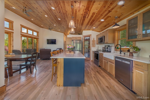 509 Red Rd, Michigamme, MI 49861 - kitchen with stainless steel appliances, a sink, wooden ceiling, recessed lighting, and light wood-style flooring