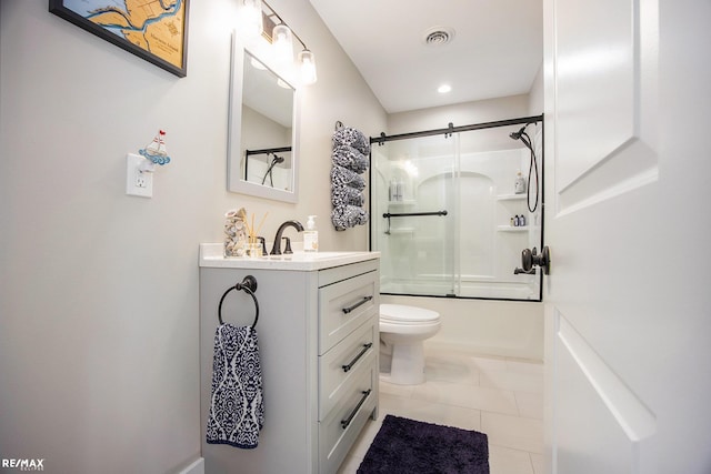 5227 Pointe Tremble Rd, Algonac, MI 48001 - full bathroom featuring vanity, toilet, shower / bath combination with glass door, and tile patterned flooring